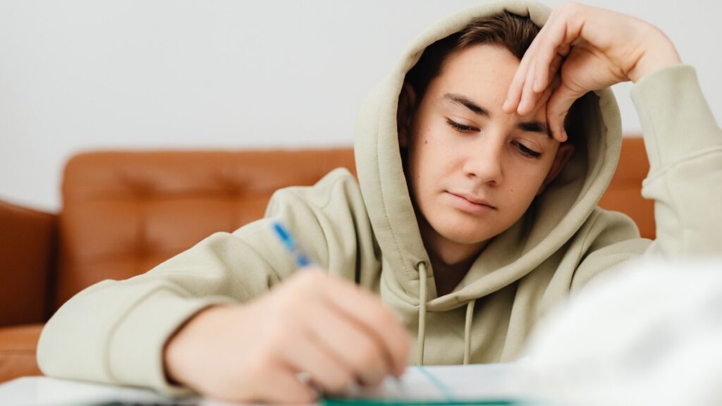 Signs of Executive Dysfunction - teen frustrated and can't start homework